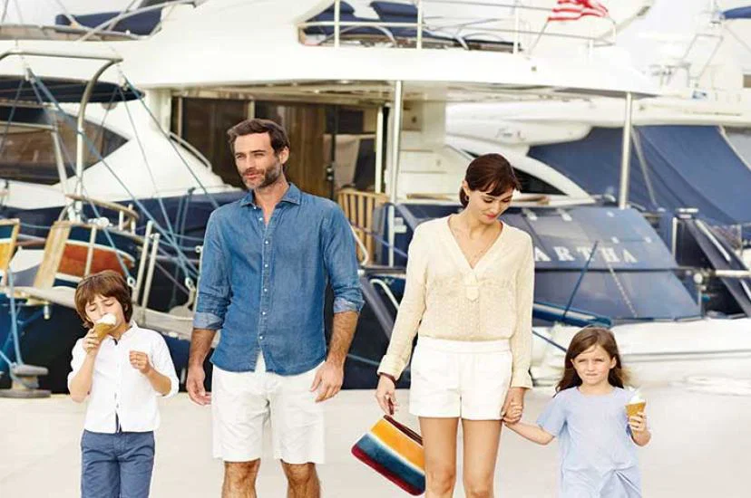 Family by sailing boat