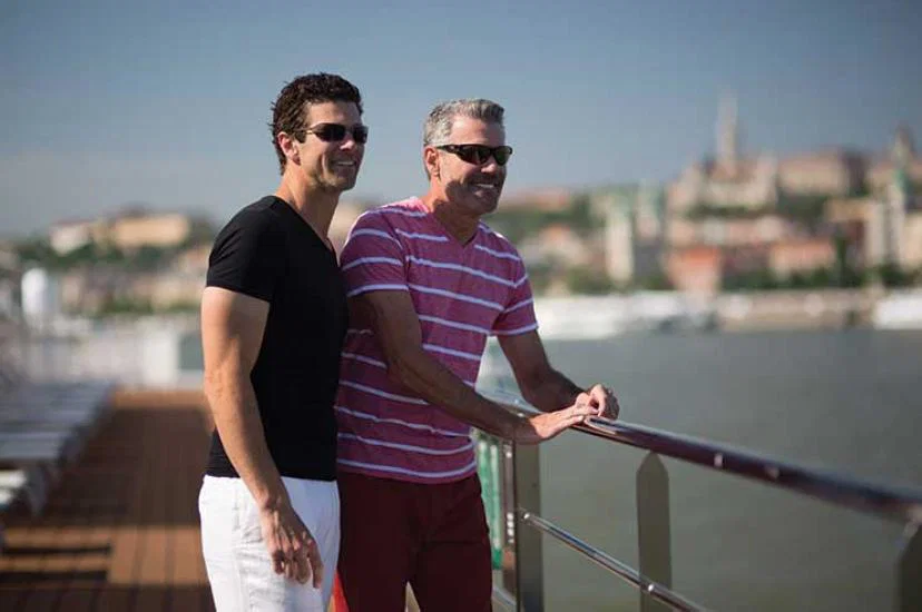 Gay couple on balcony