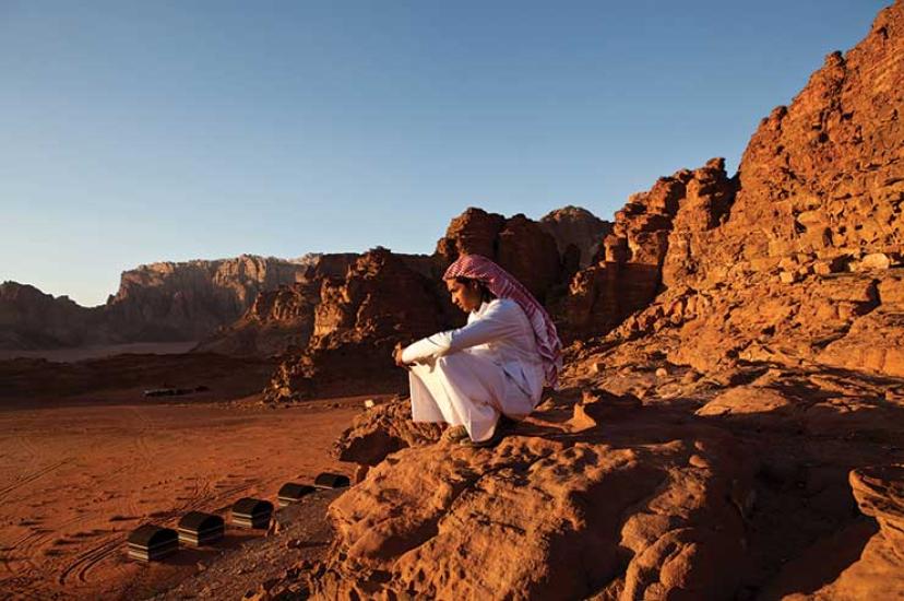 Man sitting in rocks in Jordan