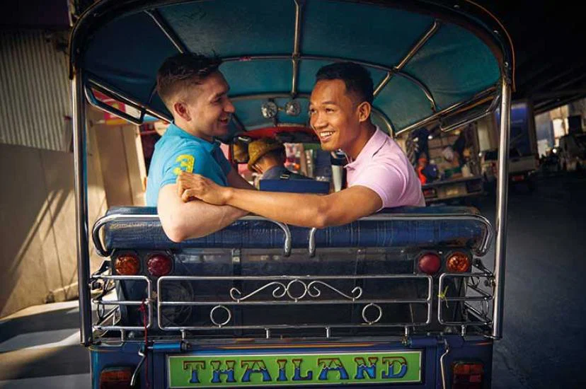 Thailand, tuk tuk and male couple