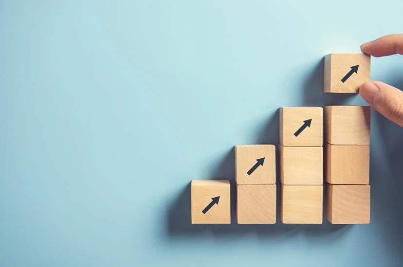 Building blocks with upward arrows on them