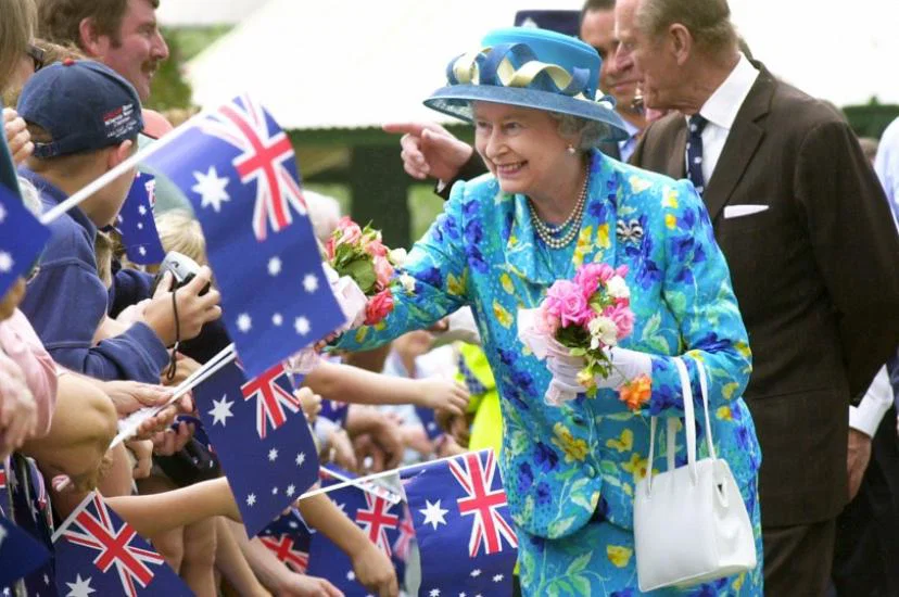 The Queen and the Duke of Edinburgh greet well wishers in Central Park, Bourke in the Australia Outback in the year 2000