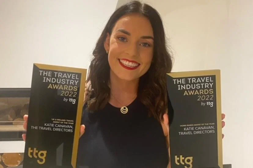 Katie and her trophies: she was on a pandemic-delayed holiday to Orlando when she found out she'd won
