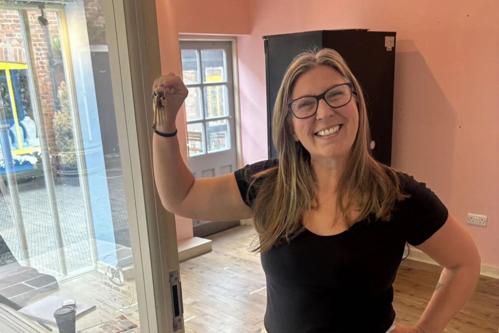 Kerry Gallagher picks up the keys to Silver Travel Advisor's second premises