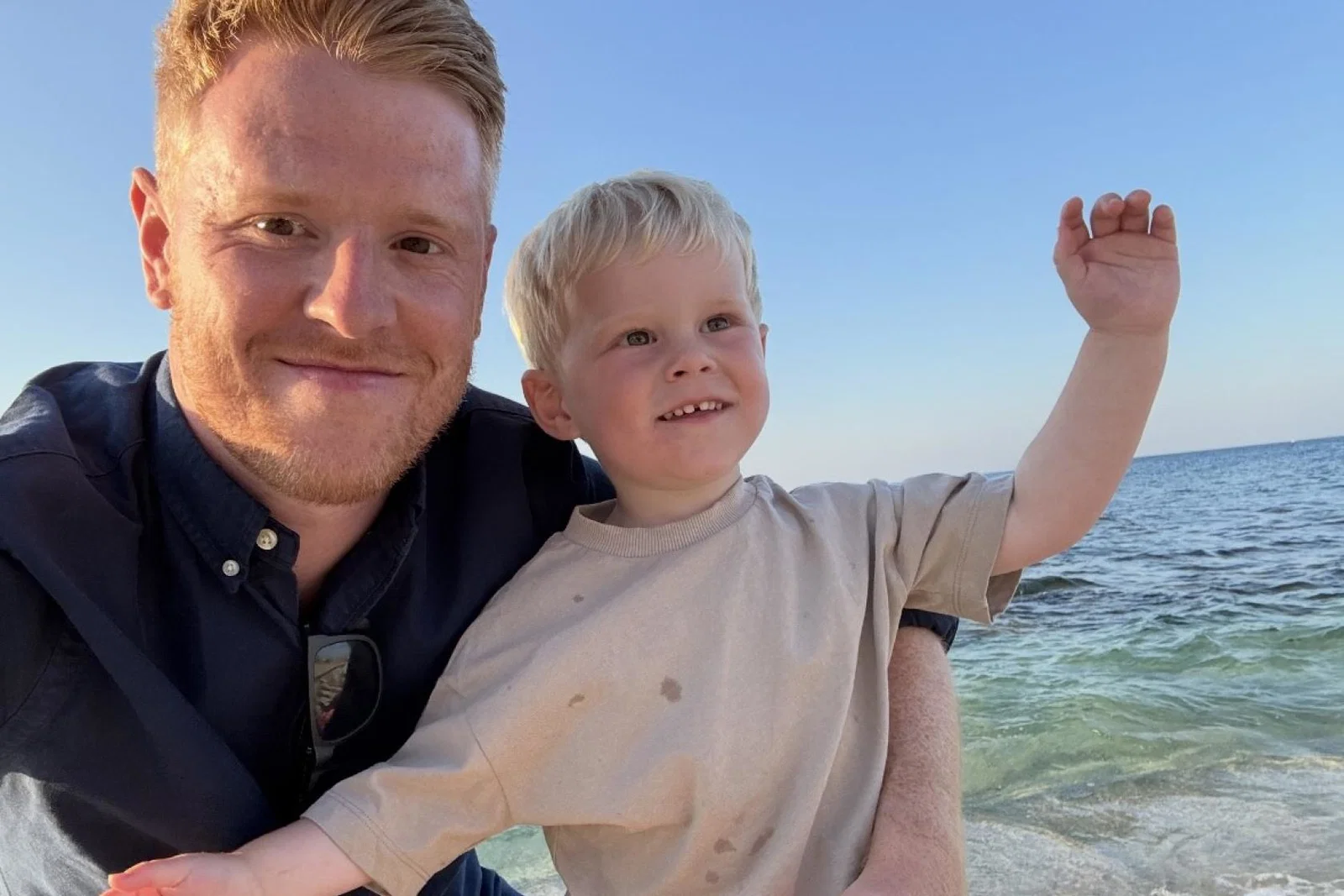 Tom Parry with his two year old son Theo on holiday in Crete