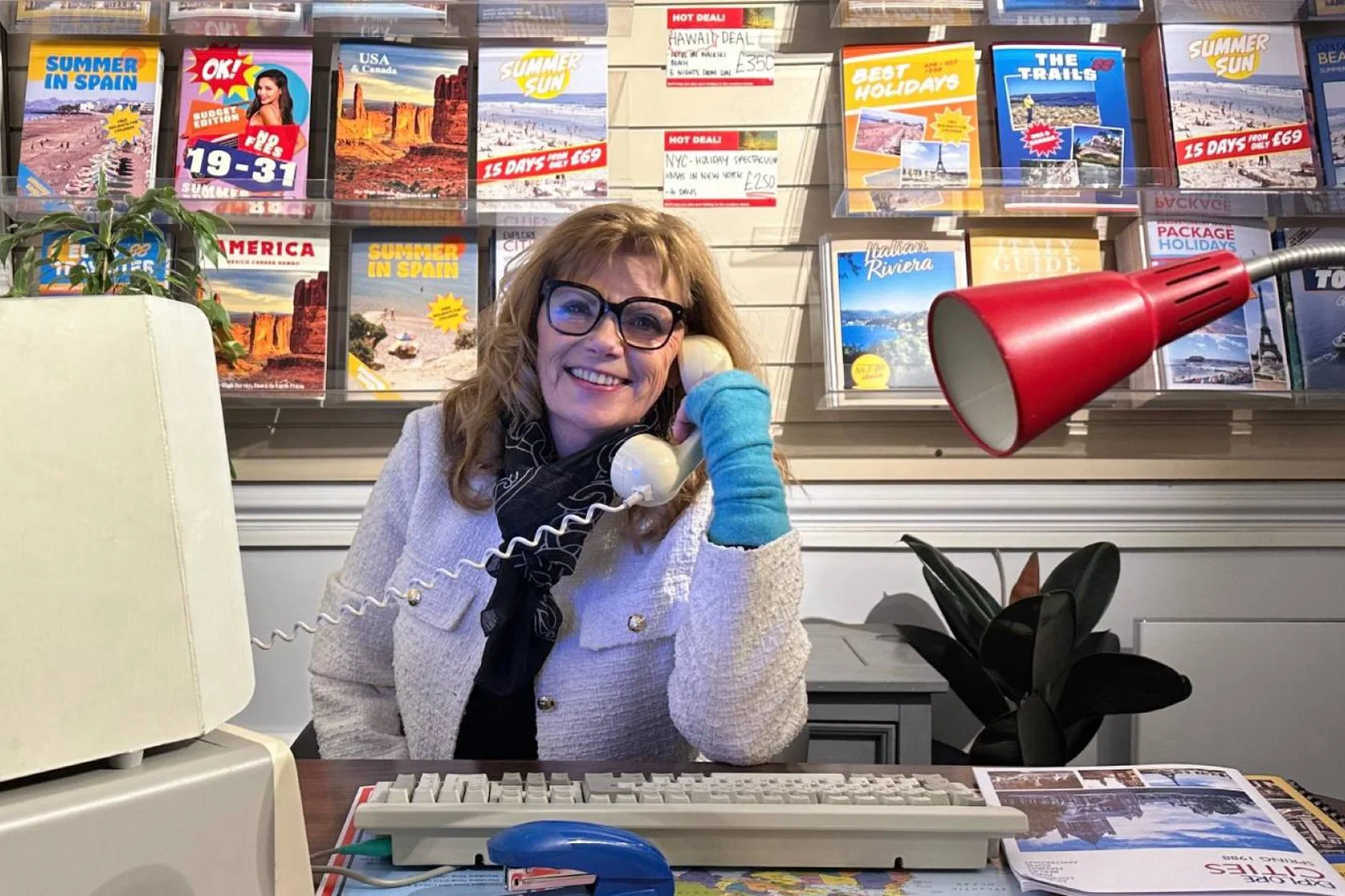 Travel Wallet founder Maggie Rogers sitting at desk