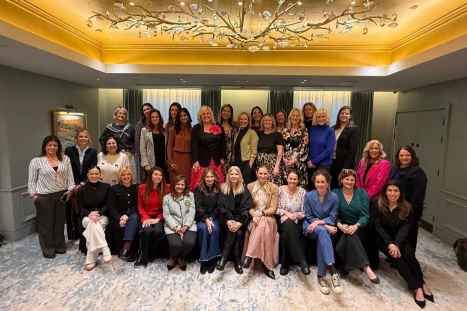 Large group of women smiling 