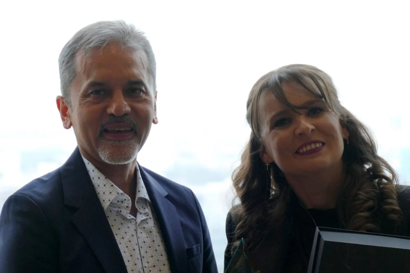 Man and woman smiling