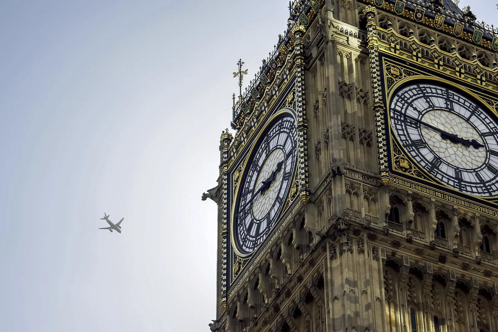 Big Ben with aircraft (stock)