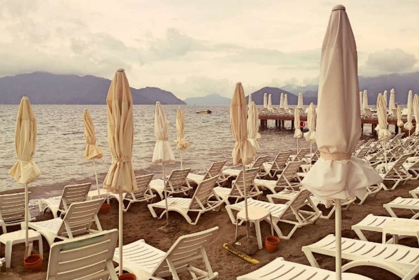 Empty beach, tourists