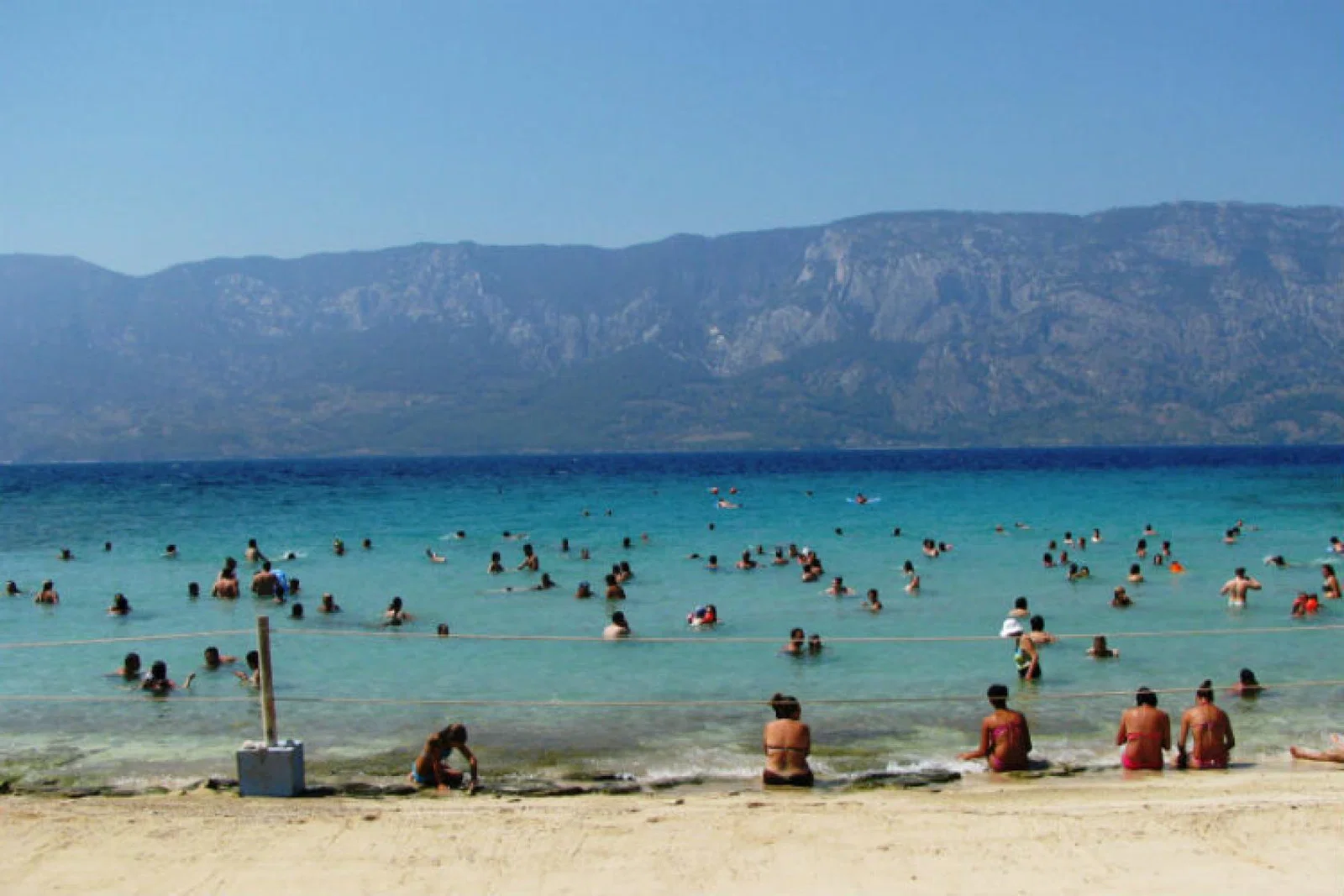 A group of tourists swimming in Sedir Island Cleopatra beach, near Marmaris, Turkey ThinkstockPhotos