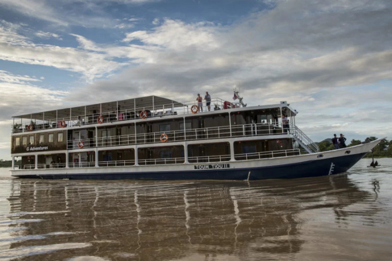 G Adventures ship in the Mekong