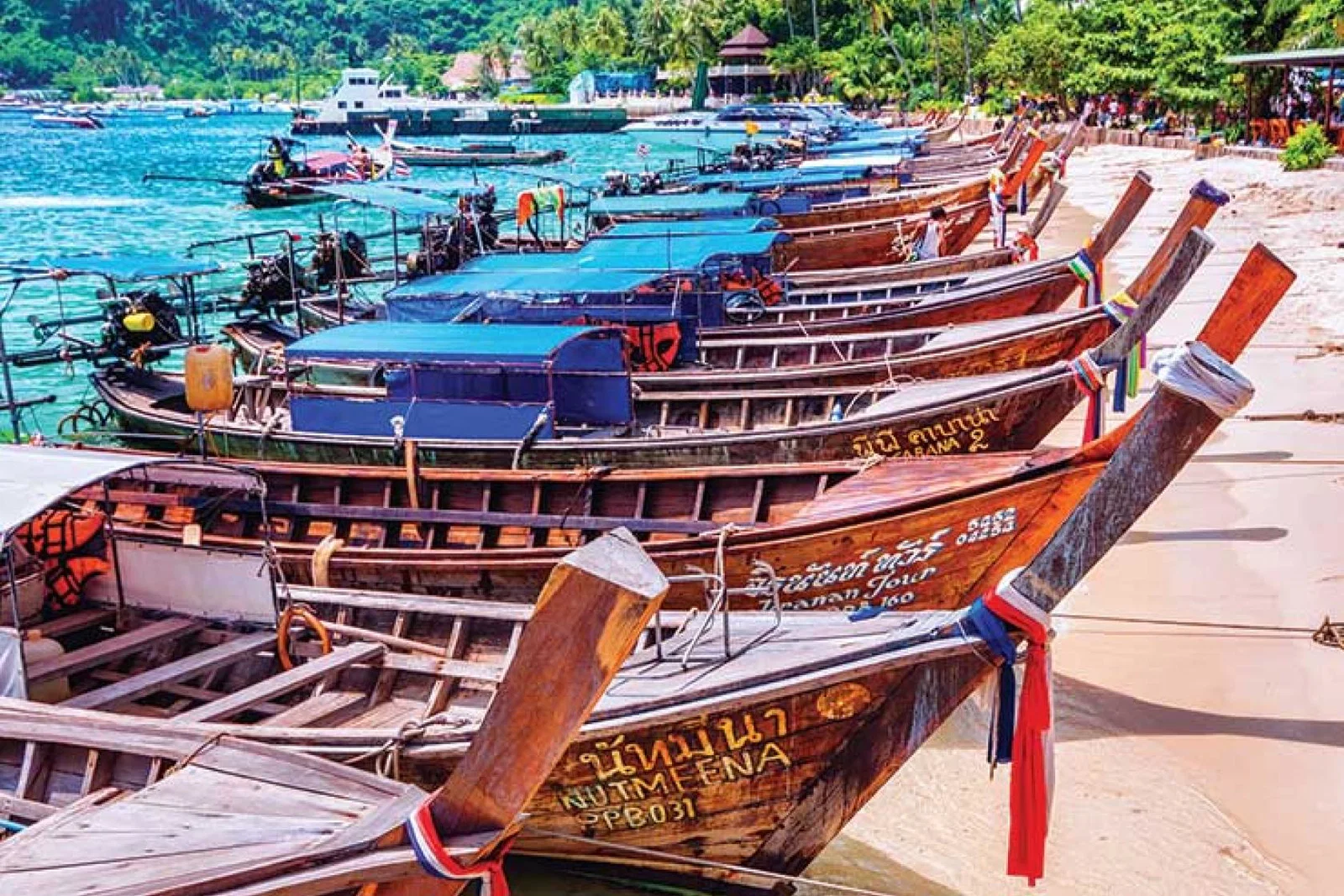 Boats on a Thailand beach iStock