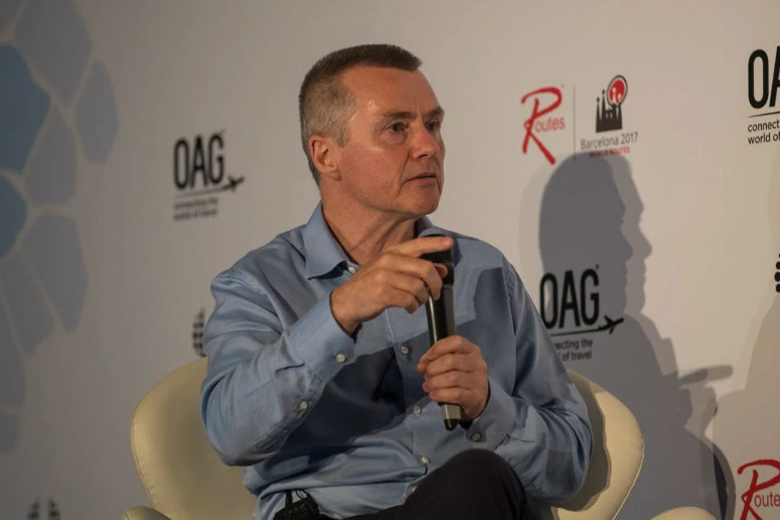 MPs criticised the bonus paid to outgoing IAG boss Willie Walsh as British Airways cut thousands of jobs