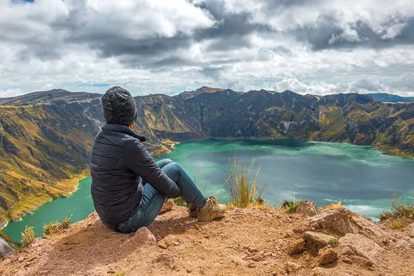 Hiker looking out over a lake