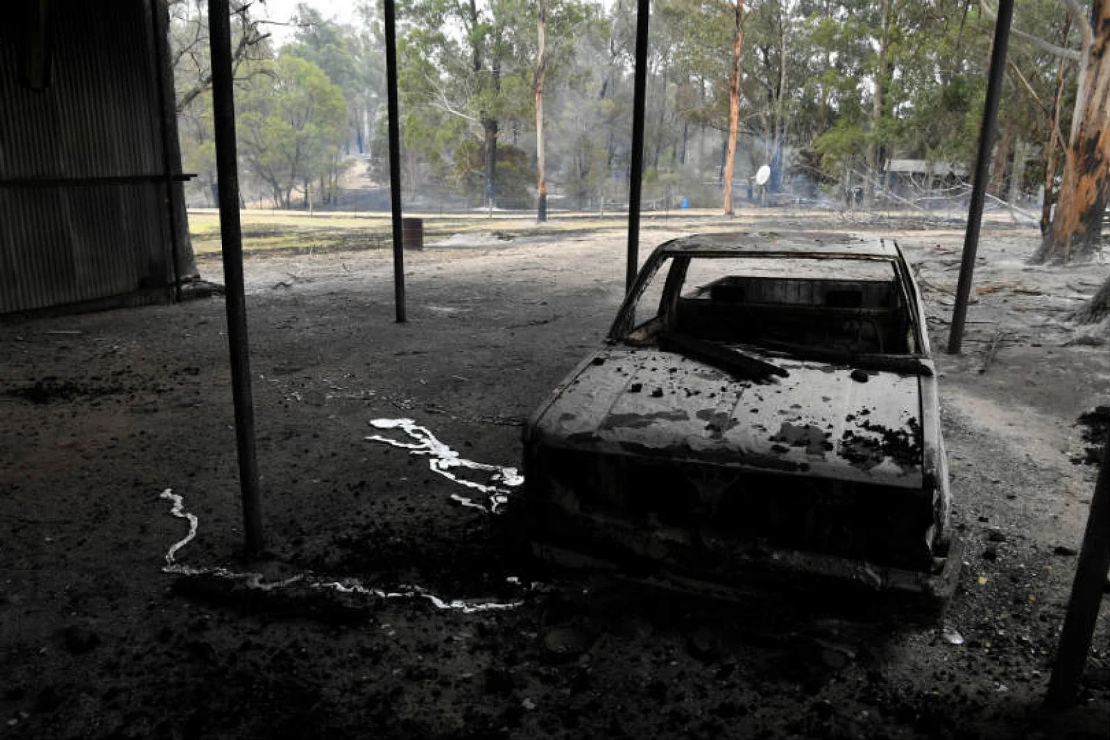 A burnt-out car after bushfires in Victoria, Australia. Picture: AAP Image/James Ross