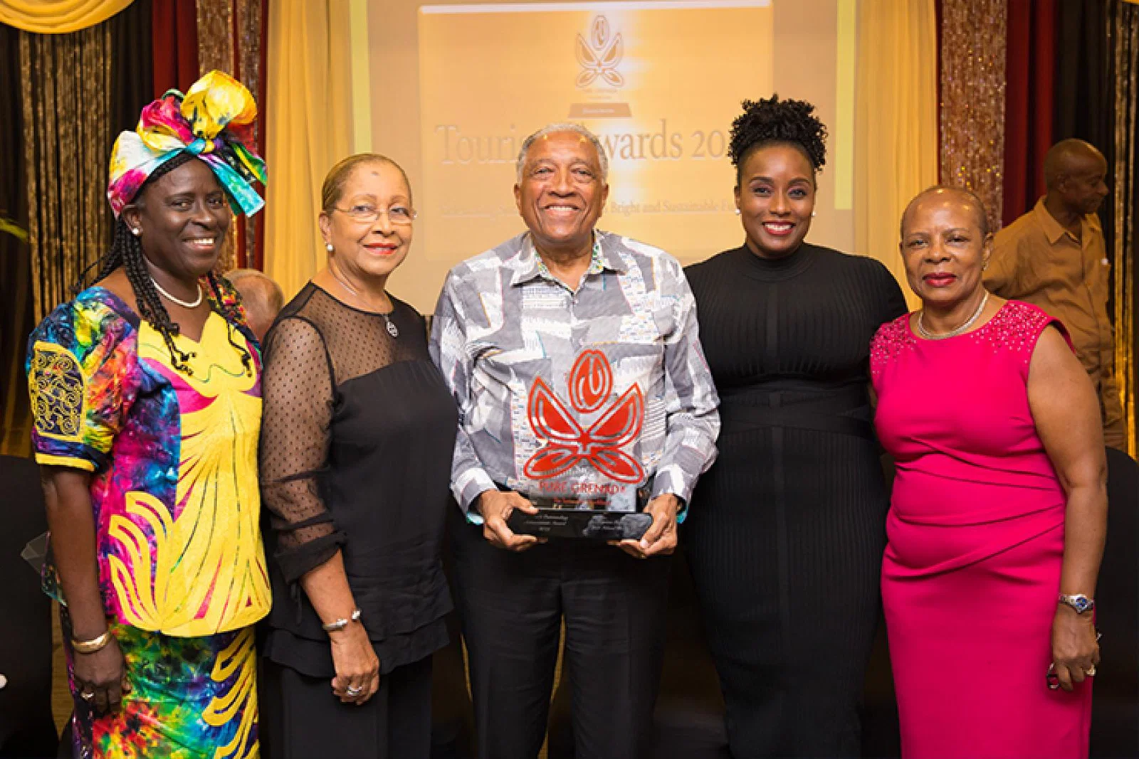 Sir Royston Hopkin pictured receiving an Outstanding Achievement Award in 2019