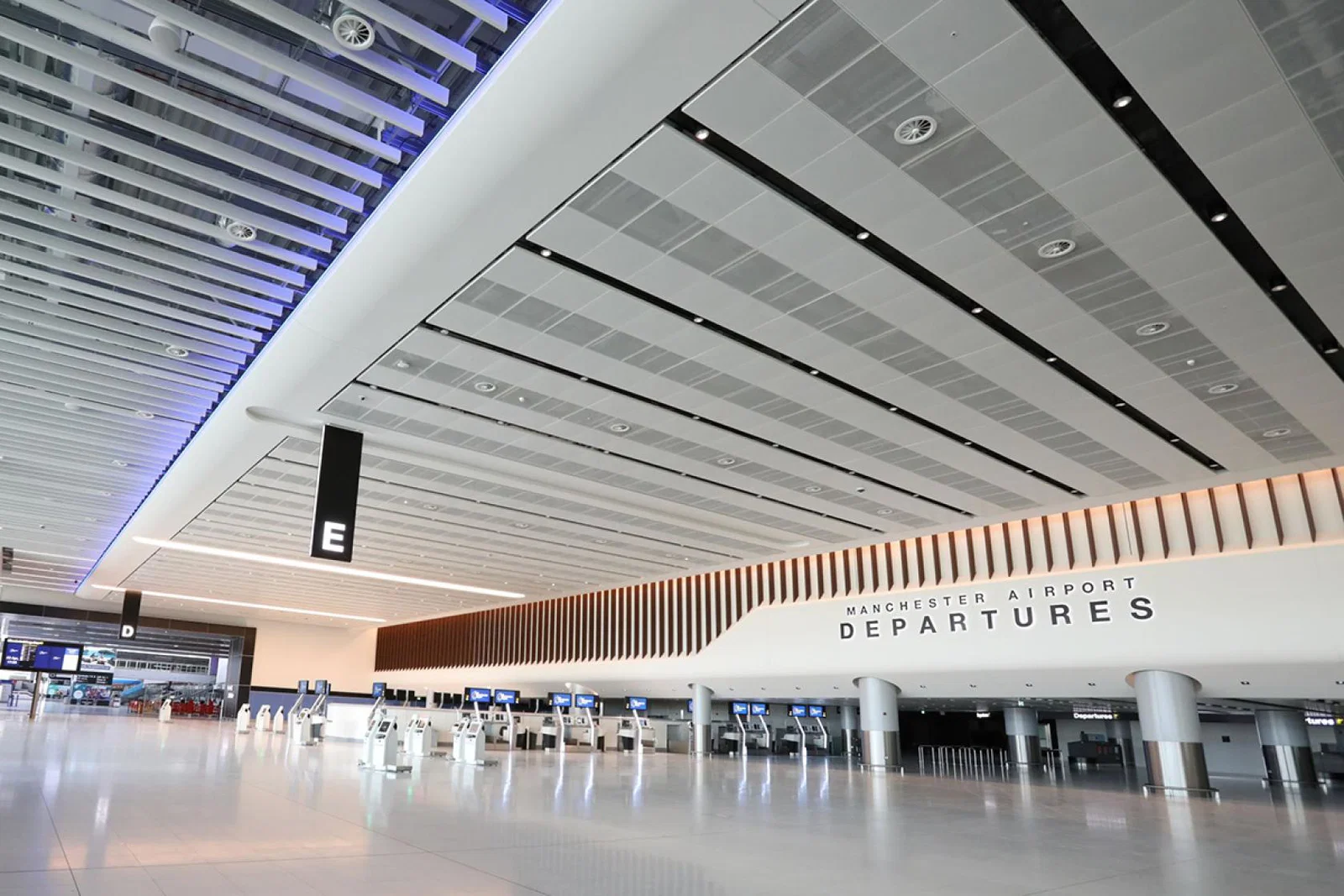 Manchester airport says its systems are ‘back up and running’