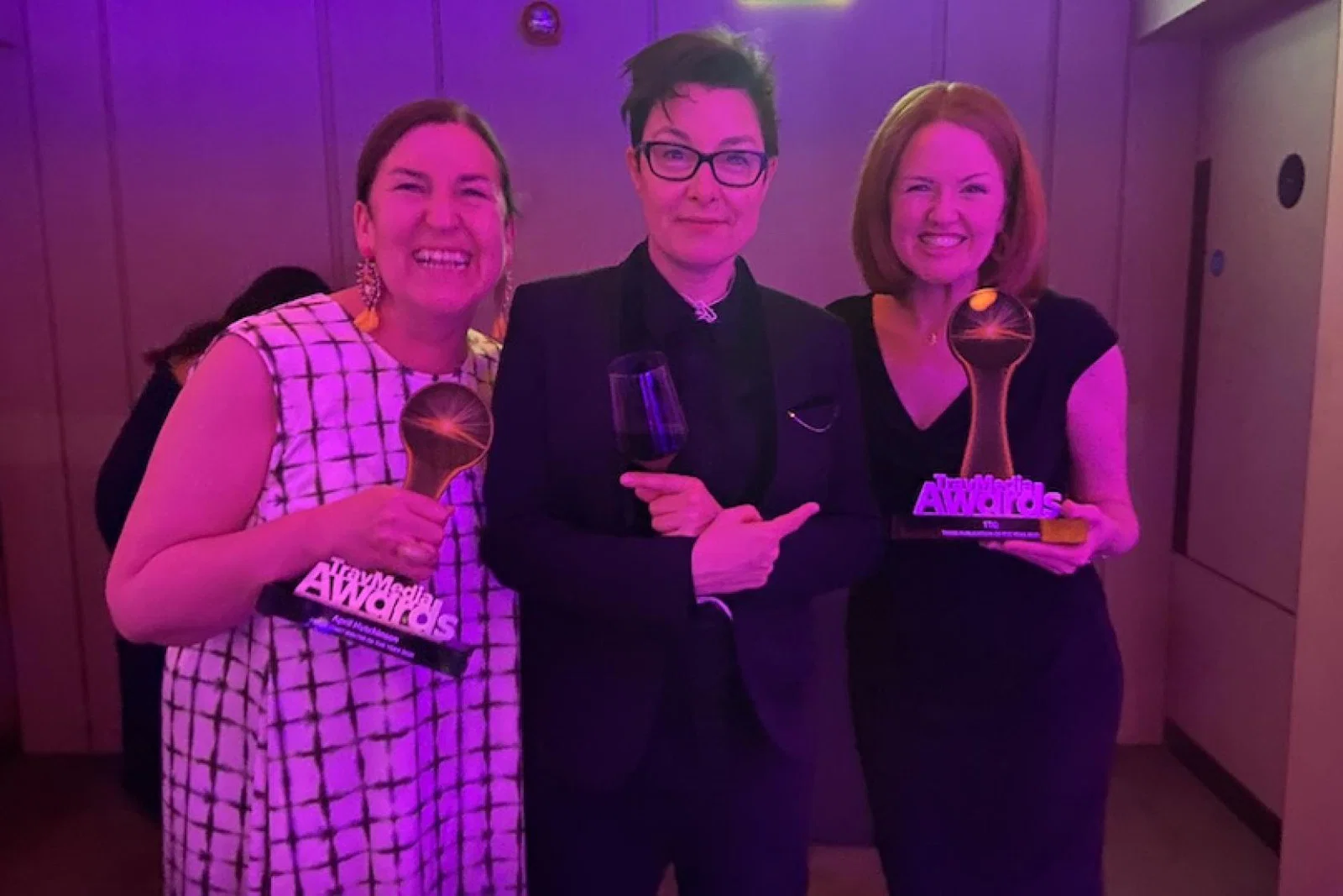 April Hutchinson (l) and Pippa Jacks (r) meet Sue Perkins at the TravMedia Awards 2022