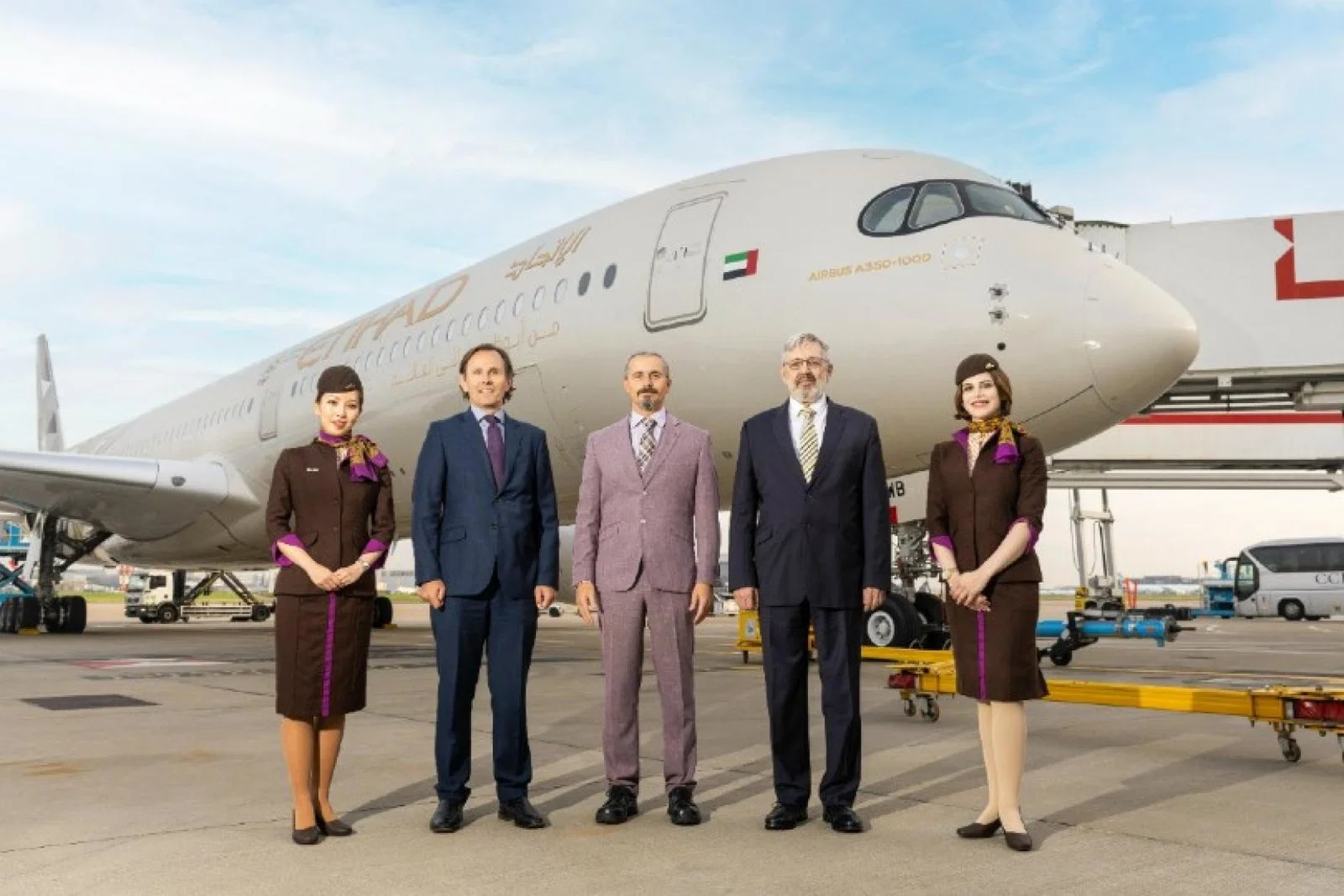 Heathrow chief commercial officer Ross Baker (second left) was among those to welcome the A350 to Heathrow
