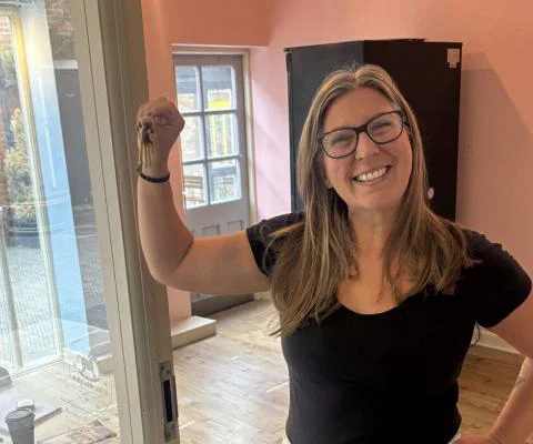 Kerry Gallagher picks up the keys to Silver Travel Advisor's second premises