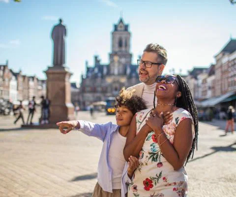 A family on holiday in Delft in the Netherlands