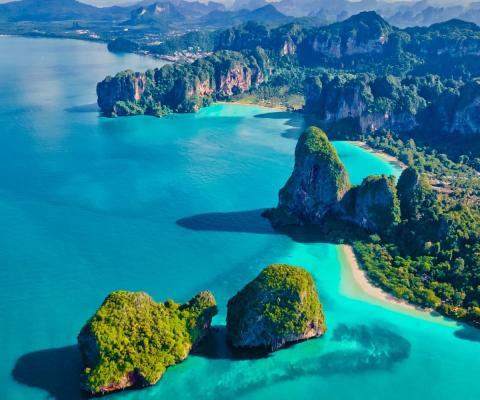 Blue water, beach and lush coast