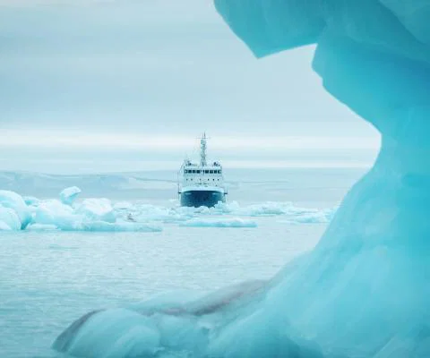 The ship Polar Athena sits in sea ice - credit Lars Korvald for Secret Atlas