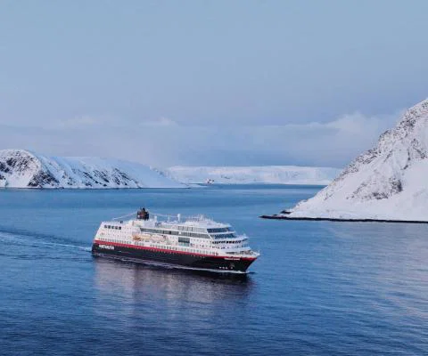 MS Trollfjord cruising the Arctic Circle