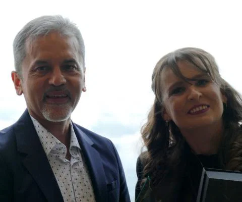 Man and woman smiling