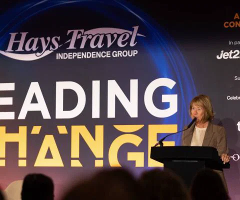 Dame Irene Hays speaking at the 2026 Hays Travel conference in Chester