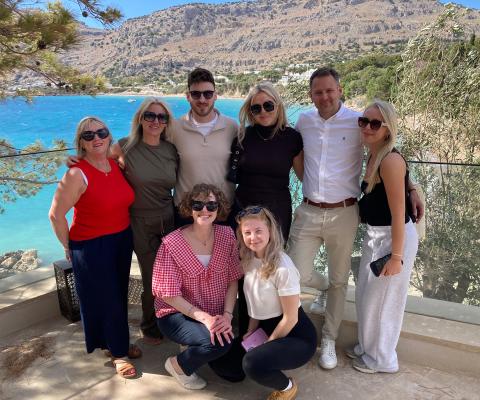 The agents by the beach at AMOH Rhodes