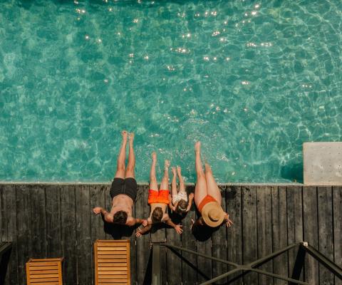 Family by the pool on an all-inclusive holiday