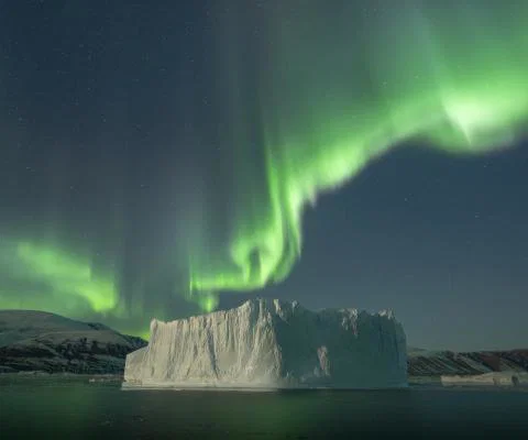 Secret Atlas voyages depart in September at the best time for encountering the Scoresbysund Northern Lights. Photographer Virgil Reglioni