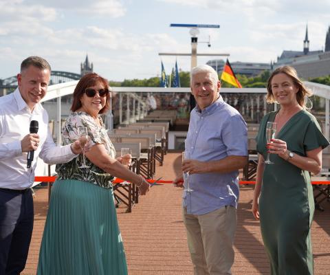 The very first guests to board Riviera Resplendence, Dave and Jacqui, were invited to cut the ceremonial ribbon with James Golding and Noeleen Pritchard