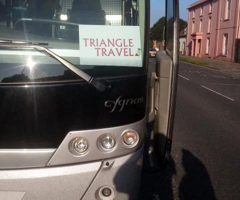 Triangle Travel coach