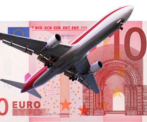 Aircraft and euro note (stock)