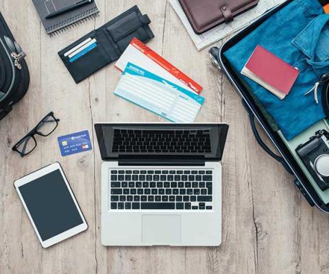 Laptop and suitcase