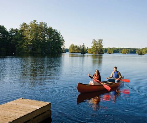 a-couple-canoeing-on-pawtuckaway-lake-in-new-hampshires-pawtuckaway-state-park_15673817713_o.jpg