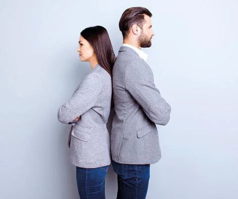 Man and woman back to back