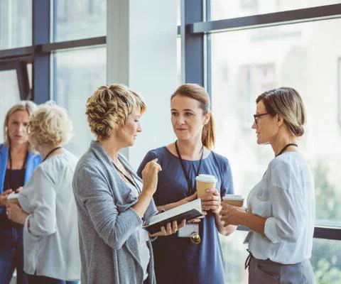 Women, gender pay gap, business, meeting iStock-1095887596