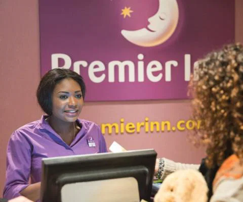 Premier Inn parent Whitbread has announced plans to reduce its workforce by nearly 20%