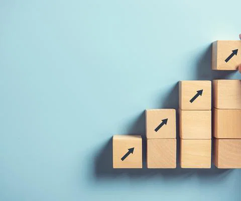 Building blocks with upward arrows on them