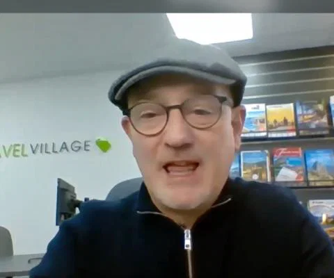 Travel Village's Phil Nuttall says they will continue booking holidays for clients