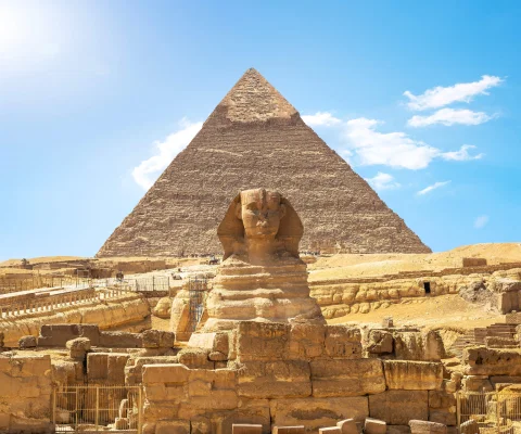 Riviera_Travel_Sphinx_and_pyramid.png