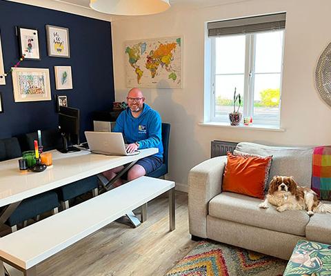 Personal Travel Agent David Russo in his home office