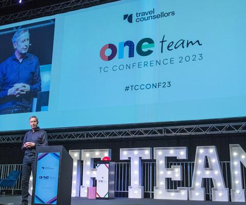Travel Counsellors boss Steve Byrne on stage