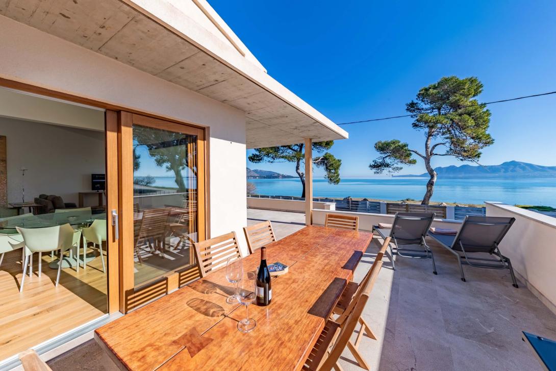 Clients can enjoy dining outside with SPL Villas An outside dining table at an SPL Villas property