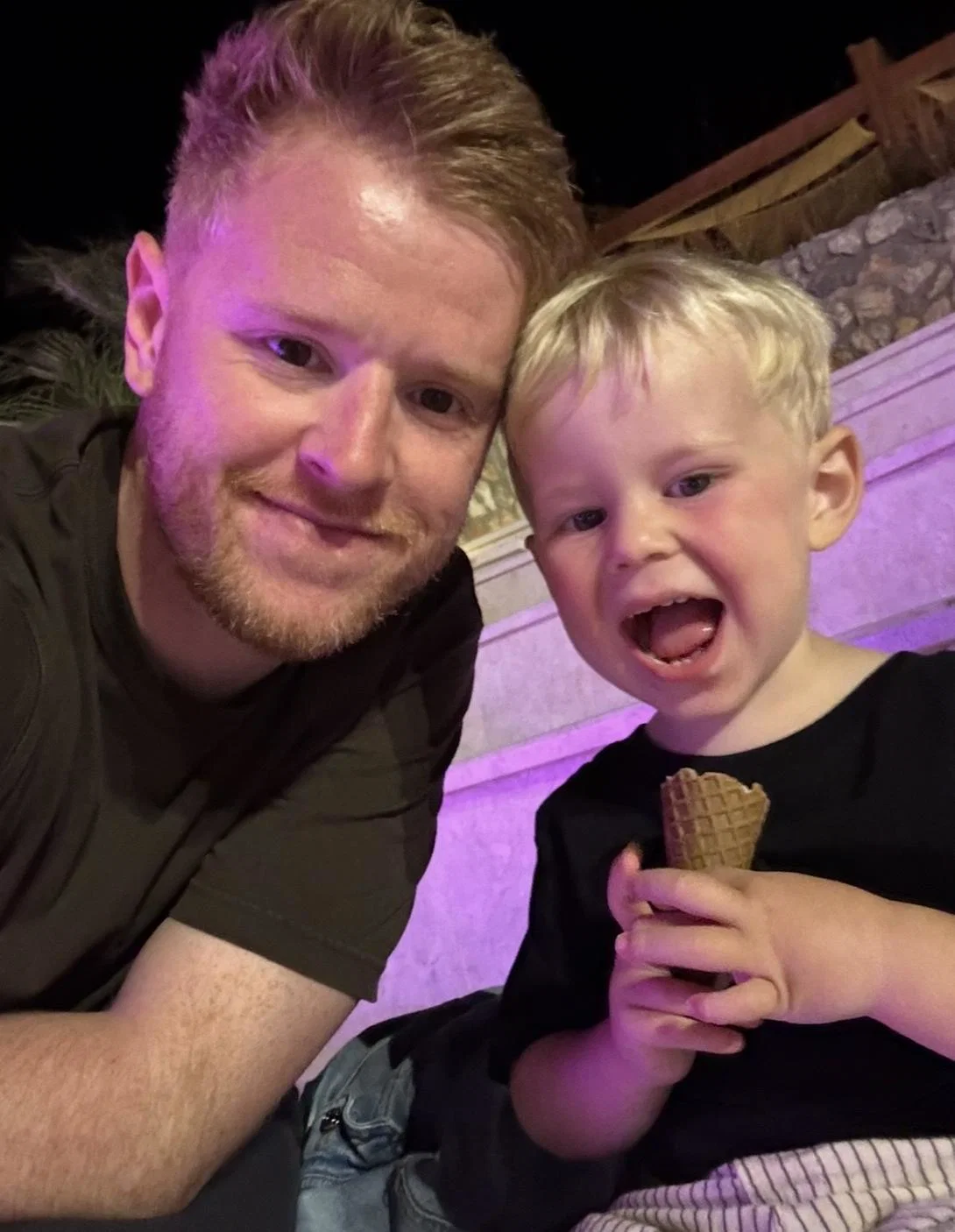 TTG Media's content producer Tom Parry with his son Theo eating an ice cream TTG Media's content producer Tom Parry with his son Theo eating an ice cream