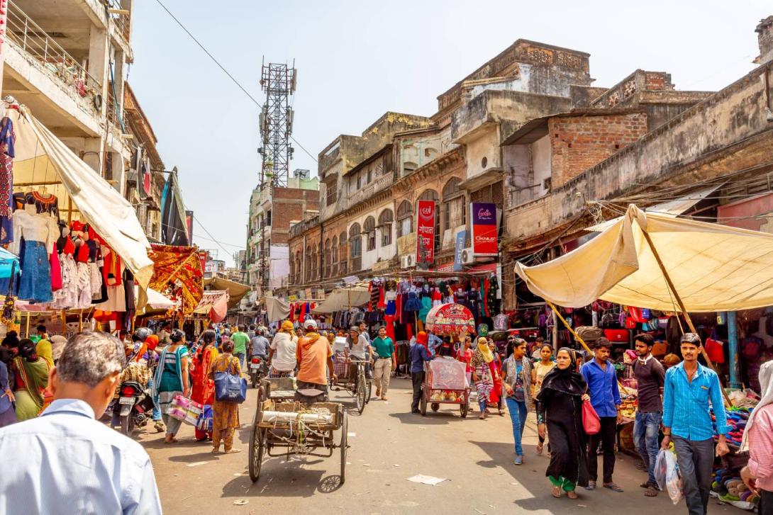 A bustling market square in India A bustling market square in India